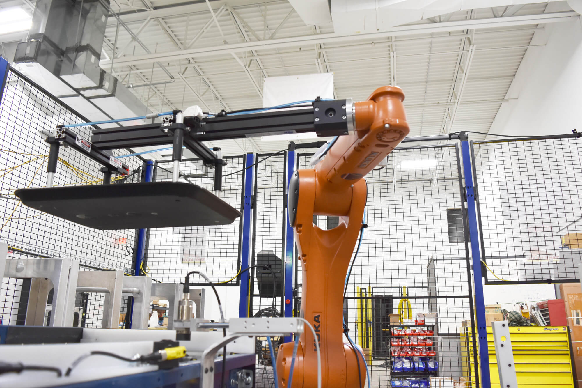 Large Kuka robot working at a production line